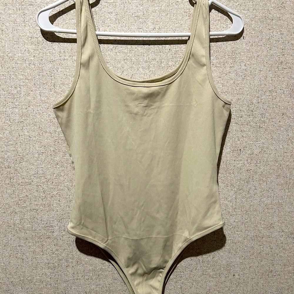 Crème bodysuit